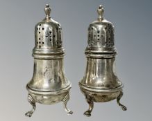 A pair of Sterling silver pepper pots, 87.6g.