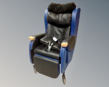 A Care Flex electric disability wingback armchair.