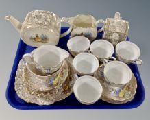 A tray of approximately 24 pieces of antique Colclough gilt tea china.