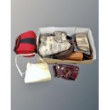 A box of assorted handbags and vanity cases