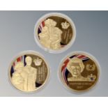 Three gold plated Elizabeth II commemorative coins