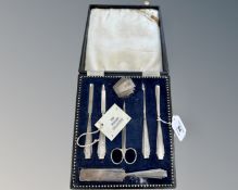 A silver Art Deco seven piece manicure set, Birmingham 1938, cased.