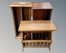 An oak magazine rack together with an oak media stand and a further media stand in a mahogany