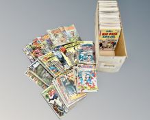 A box containing a large collection of vintage and later comics including Classics Illustrated,