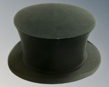 A collapsible top hat by Cunningham & Co. of Edinburgh.