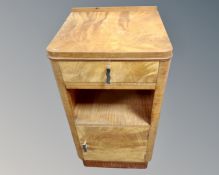 A bleached walnut Art Deco bedside cabinet fitted with a drawer (width 37cm)