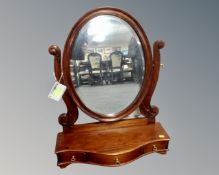 An eastern hardwood Victorian style dressing table mirror fitted with three drawers on stand.