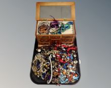 A tray containing contemporary jewellery box containing costume jewellery, bead necklaces etc.
