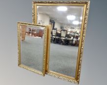 Two gilt framed bevel edged mirrors.