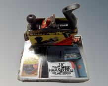 A Stanley SB 3 woodworking plane together with a Black & Decker H552k hammer drill.