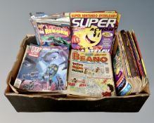 A box of assorted comics including 2000AD, The Beano, Nintendo etc.