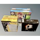 A boxed Nespresso Essenza mini coffee maker together with a boxed HP printer and a Fellowes paper