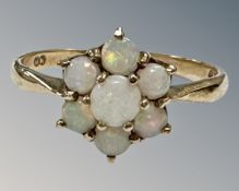 A 9ct gold opal cluster ring, cluster diameter 9 mm, size L, 1.5g.