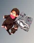 A 20th century Chad Valley monkey soft toy together with a further miniature version and a pair of