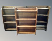 Three sets of 20th century open bookshelves.