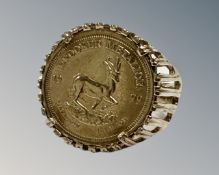 A 9ct yellow gold 1999 Republic of Futoria Krooker Metalior coin ring, 5.2g, size M.