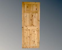 A pine interior panel door (width 77cm)