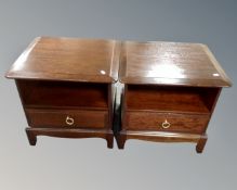 A pair of Stag Minstrel bedside stands fitted with a drawer (width 53cm)