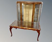A 1930s D-shaped display cabinet (width 105cm) together with a further glass topped coffee table.