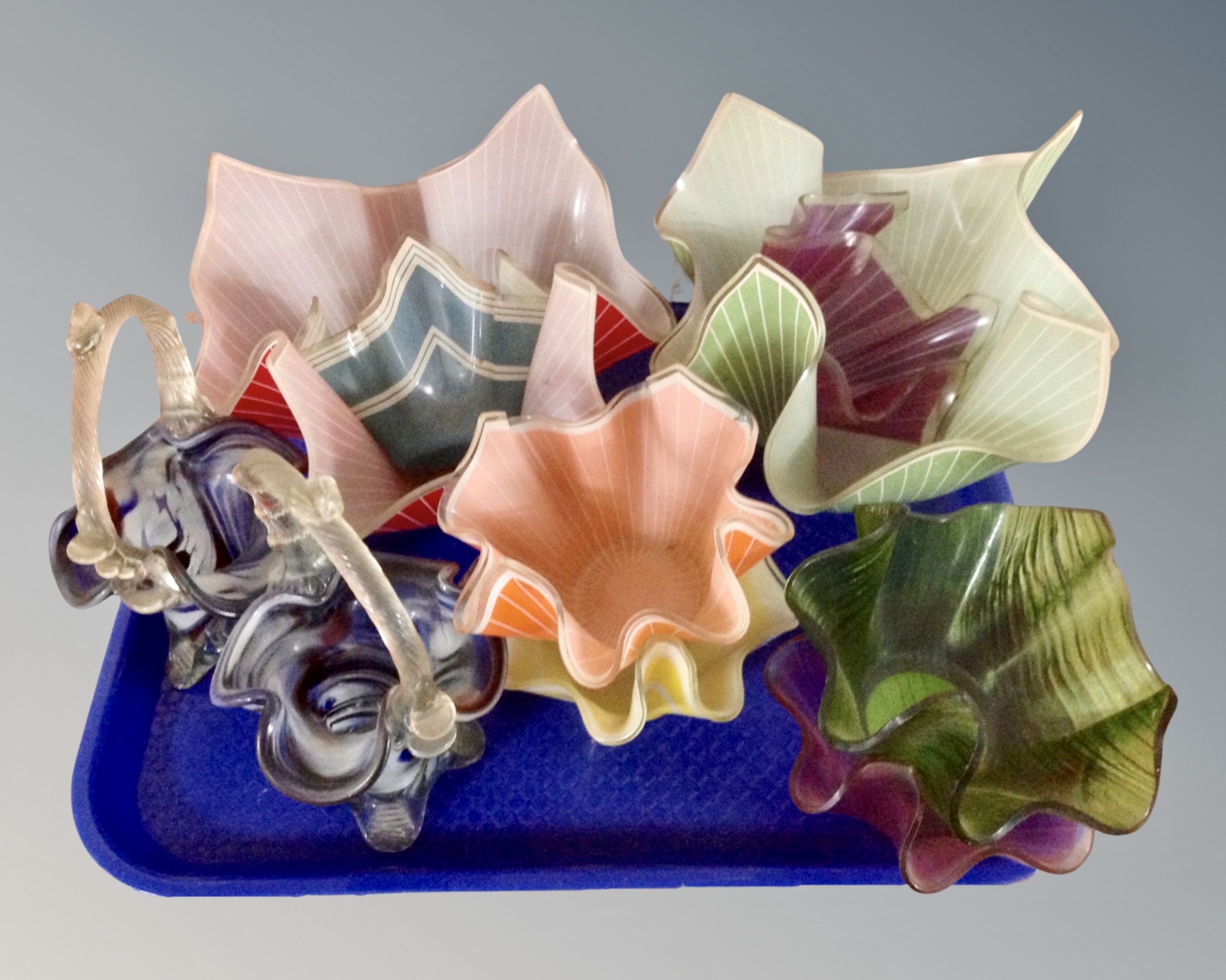 A tray of eight 1970's glass handkerchief bowls together with a pair of Venetian glass baskets