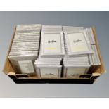 A box containing a large quantity of Xenos 13cm by 18cm silvered photo frames.