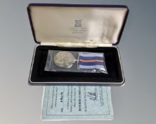 A Pobjoy Mint tribute medal with ribbon and certificate for Bomber Command 1939-45, No.