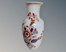 An Oriental style ceramic baluster vase (height 31cm)