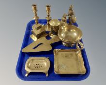 A tray of assorted brass ware including postbox money box, iron stand, pair of candlesticks,