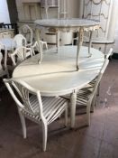 A white and gilt oval extending dining table with leave, length 184 cm,