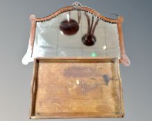 A 19th century mahogany arch topped mirror together with a further 19th century marquetry inlaid