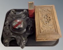A tray containing 19th century ebonised and painted wooden crest, carved trinket box,