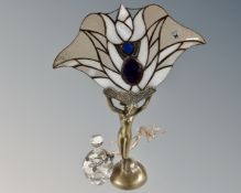 A contemporary Art Deco style figural table lamp together with a flower fairy glass perfume bottle