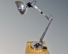 A contemporary angle poise table lamp.