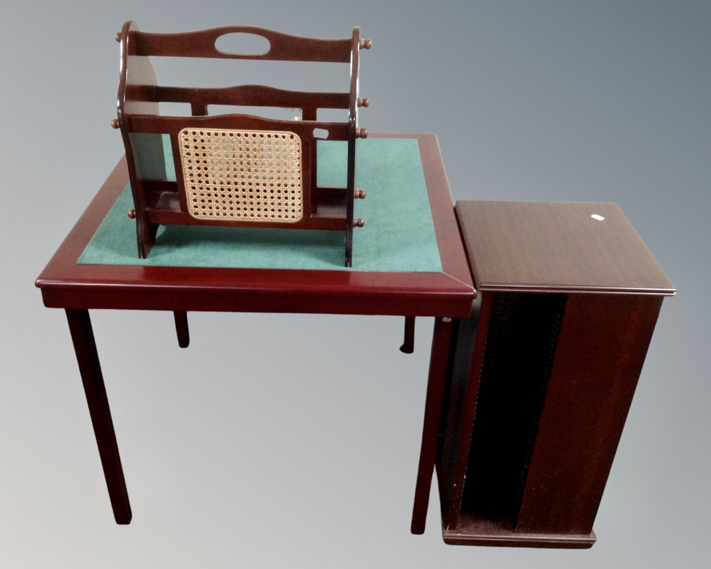 A folding baize topped coffee table together with a magazine rack and a media stand,