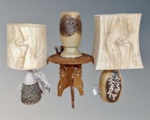 A group of three West German pottery lamp bases together with an Eastern small circular occasional