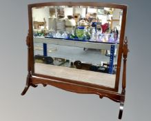 A mahogany Regency style dressing table mirror on stand