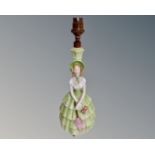 A Continental figural porcelain lamp base (height 29cm) CONDITION REPORT: Not wired.