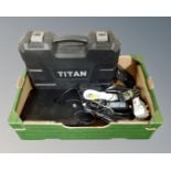 A cased Titan electric hammer drill, a digital set top box, leads,
