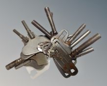 A collection of 11 early 20th century steel clock keys including Smiths.