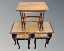 A nest of three 20th century teak G plan tables together with a further nest of three tables.