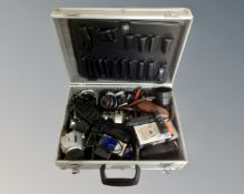 An aluminium case containing cameras including Pentax MX, Pentax MZ-7, camera accessories etc.