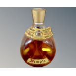 A vintage bottle of Dimple Old Blended Scotch Whisky 70% proof