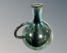 An 18th century silvered glass decanter (height 22cm)