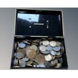 A cash tin containing a quantity of mainly British pre-decimal coins.