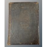 A 19th century leather bound family devotional bible