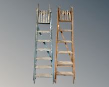 Two sets of vintage folding steps.