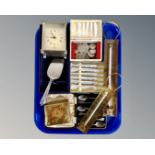 A tray of cased cutlery and server, brass thermometers,