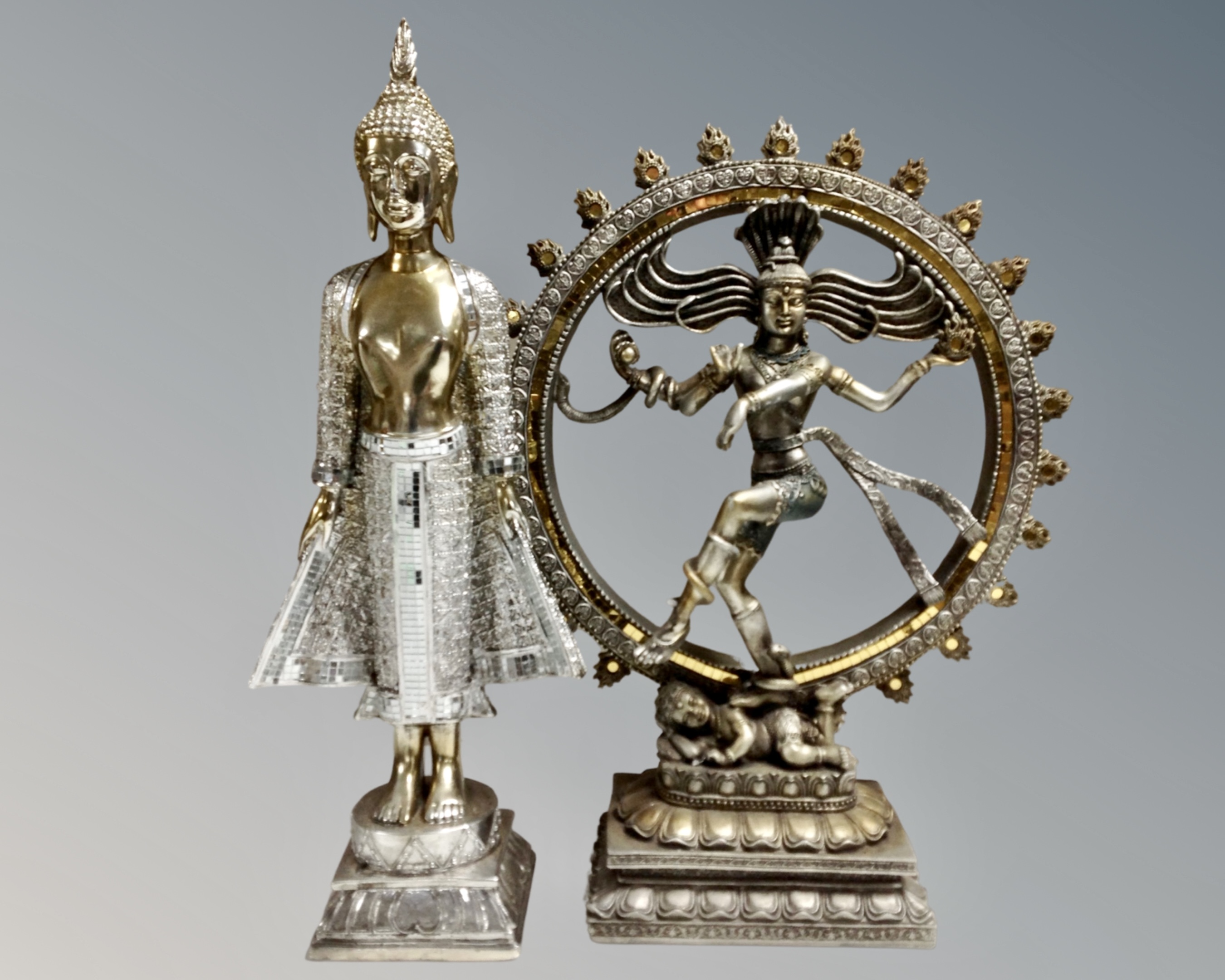 Two South-East Asian style silvered figures depicting Buddha.