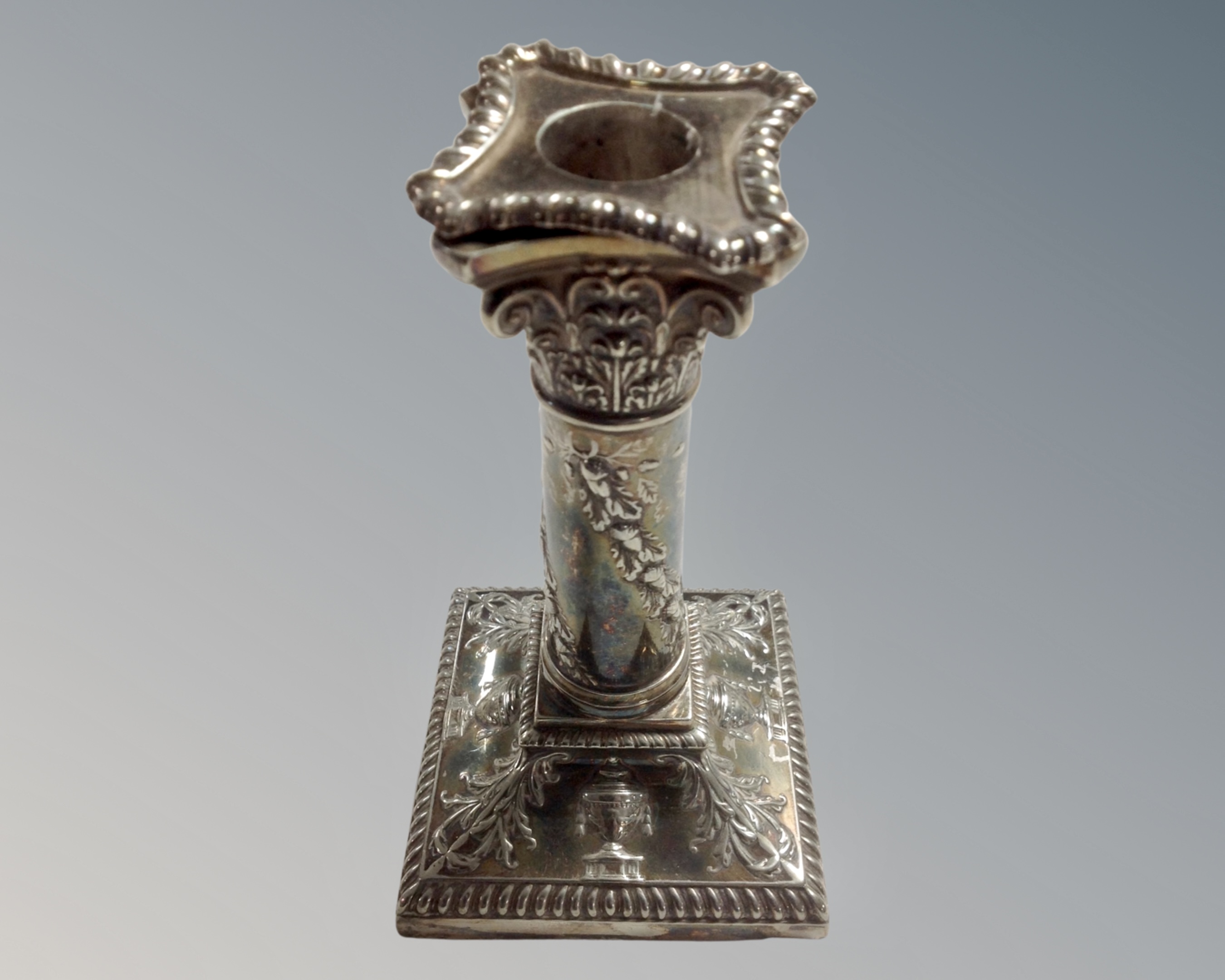A Walker & Hall silver plated Corinthian column candlestick (height 15.