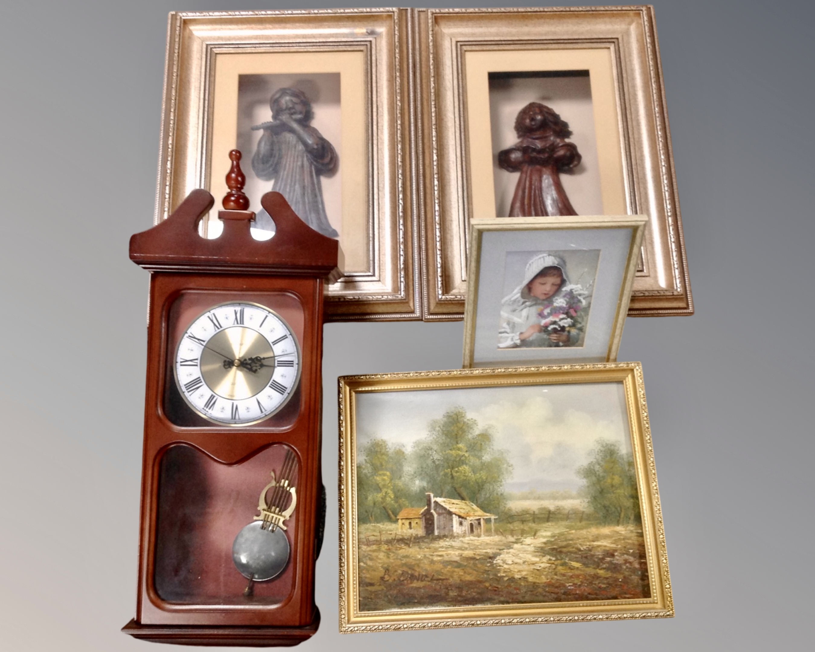 A box of two relief panels in display frames, oil on canvas,